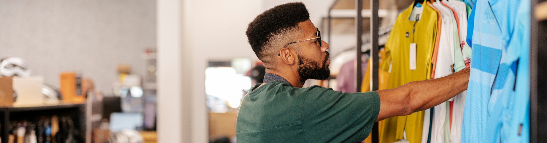 Small business owner stocking their shelves with goods.